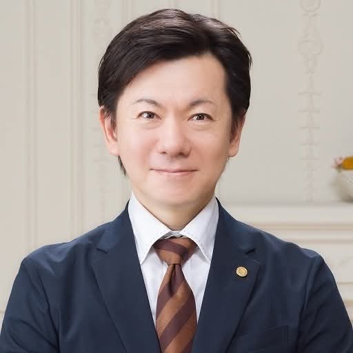 成田　新一